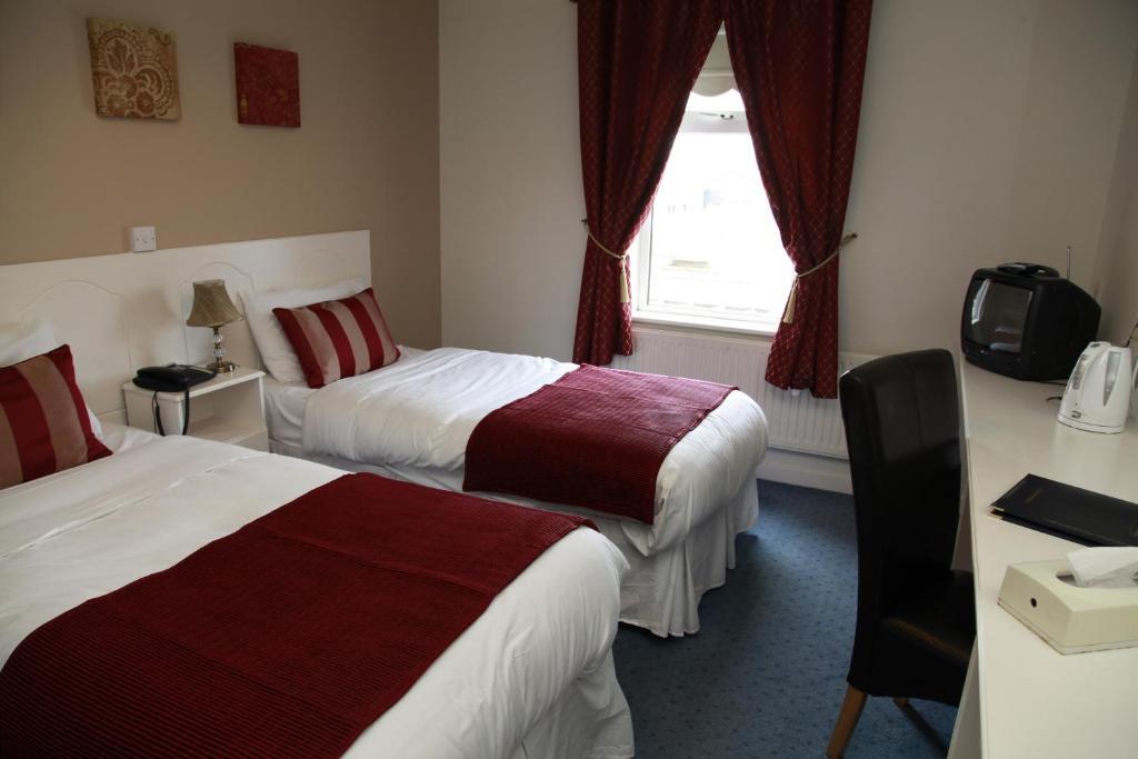 Dalton Inn Hotel Клерморис Стая снимка